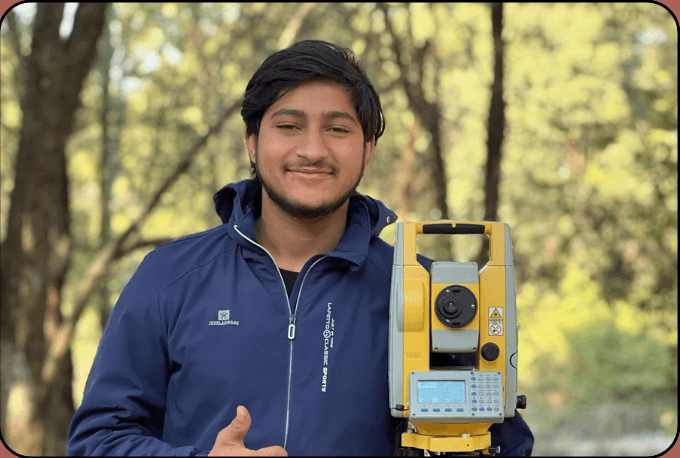 Suman Kattel carrying out surveying fieldwork